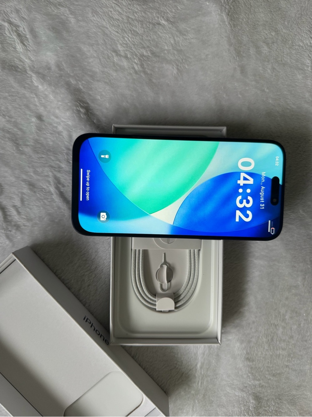 Apple iPhone Blue with Android features White Charging Cable